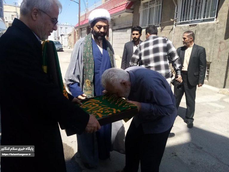 پرچم حرم مطهر امام رضا (ع) مهمان منزل شهدای کنگاوری